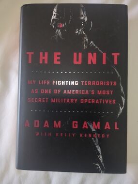 The Unit by Adam Gamal - Black and Red Hardcover Book